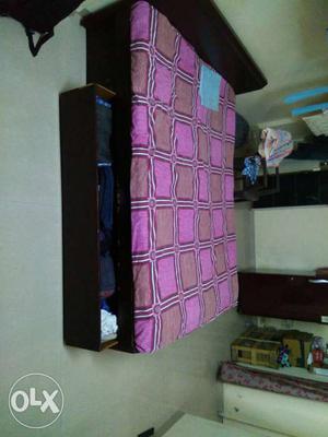 Black Wooden Storage Bed With Pink Mattress