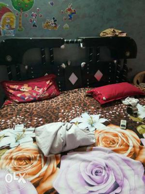 Black double bed with box