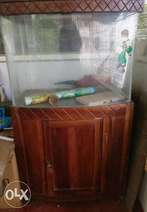 Compact Fish tank on wooden frame with storage