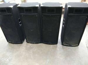 Four Rectangular Black Speakers