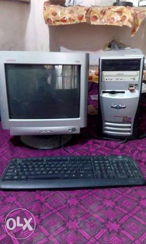 Gray Computer Tower, Monitor And Keyboard