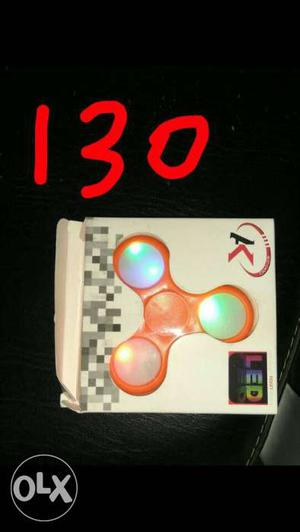 Orange Three-bladed Fidget Spinner With LED In Box