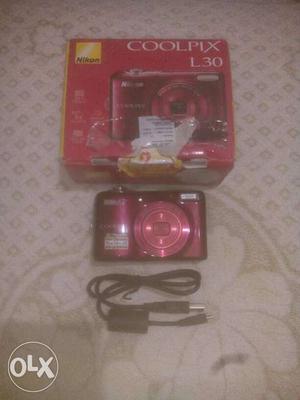 Red Nikon Coolpix. Price little negotiable.