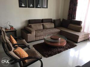 Sofa set with central table, two chairs and