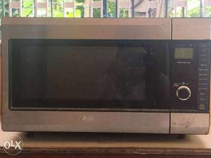 Stainless Steel And Black LG Microwave Oven