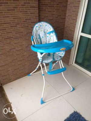 The high chair from Love Lap used by my 2 year