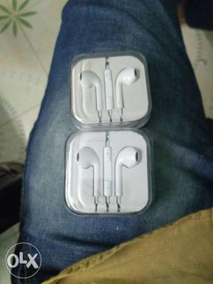 Two Apple EarPods