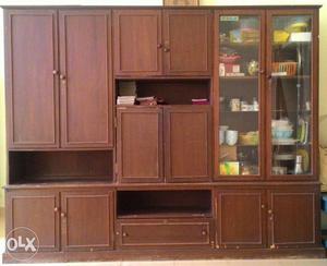 Wooden cupboard in good condition with elegant