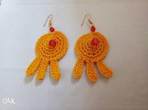 Handmade earrings..yellow colour with red beads.