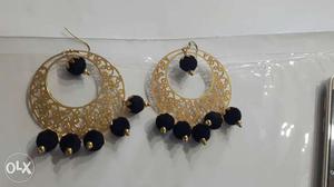 Pair Of Gold-and-black Earrings
