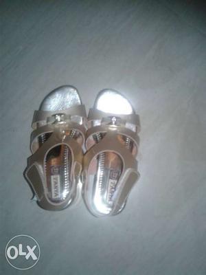 Pair Of Silver Leather Sandals