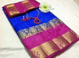 Pink And Blue Textile With Gold Print