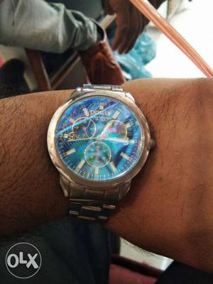 Round Blue Faced Chronograph Watch With Silver Linked