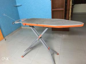 Beige And Orange Ironing Board