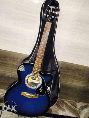 Black And Blue Acoustic Guitar With Bag