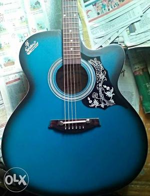Blue Cut-away Acoustic Guitar