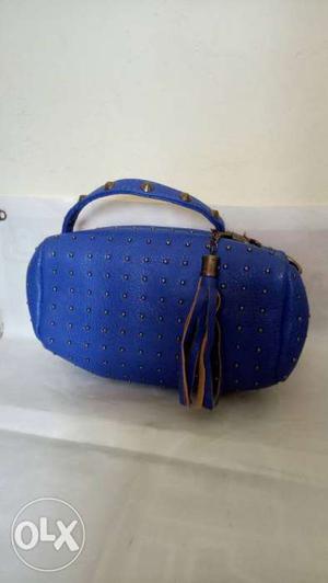 Blue Leather Duffel Bag