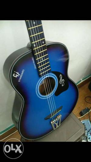 Blue and black Acoustic hollow guitar, and 6