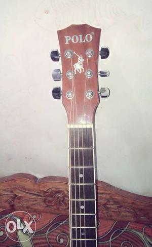 Polo acoustic guitar 6 month old with all new strings