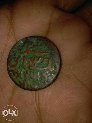 Round Green And Brown Mughal Coin
