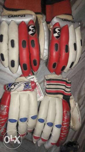 Two Paired White-and-red SG Cricket Gloves