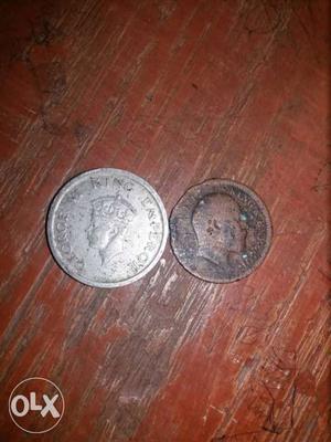 Two Silver And Copper Round Coins