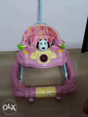 Baby walker (6 to 12 months). Unused as my little