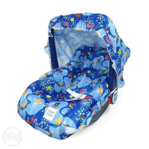 Baby's Blue And Green Car Seat Carrier