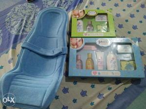 Baby's Blue holder And Two Johnson Baby Gift Sets