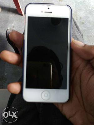 Iphone 5, new condition. Only cherger.