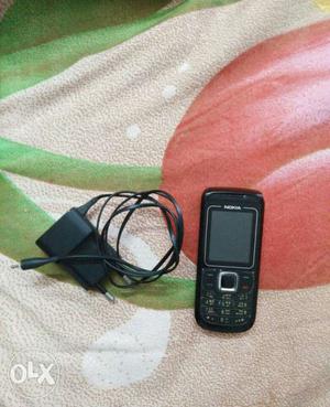 Lady used c mobile with charger