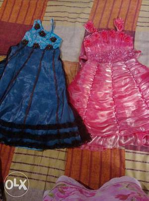 New not used..Two Girl's Red And Blue Silk Sleeveless