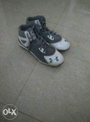 Pair Of Black-and-white Under Armour Basketball Shoes