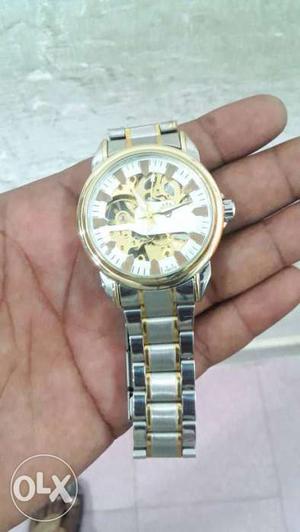 Round White And Yellow Mechanical Watch With Silver And Gold