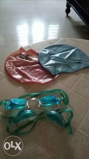 Sparingly used goggles and head cap for kids