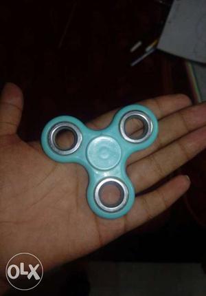 Teal And Silver Hand Spinner