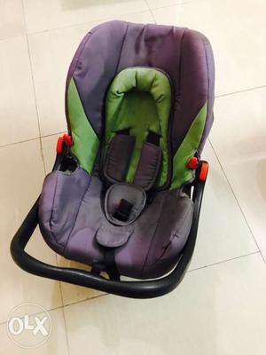 Toddler's Purple And Green Car Booster Seat