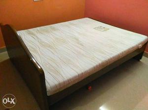 1 year old wooden cot with mattress. Actual price