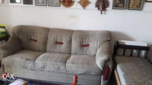 3 seater sofa with fabric upholstery.