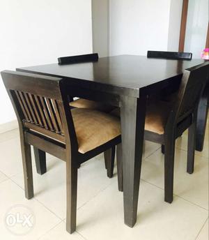 A customised 4 seater dining table n chairs set made in