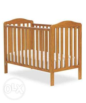 Baby's Brown Wooden Crib With Mattress