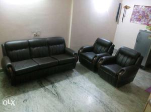 Black Leather Three Seater Couch And Two Armchairs