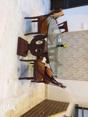 Brown Wooden Dining Table And Chairs