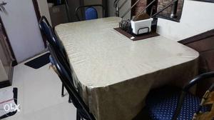 Dinning table with 5 Nos of steel cushion chairs
