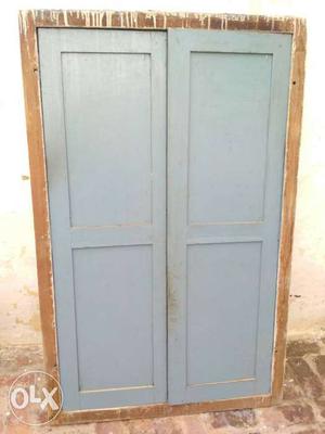 Gray And Brown Wooden 2-door Cabinet