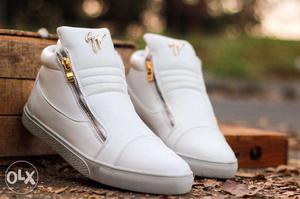 Pair Of White Geussip Zanoti Shoes