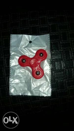 Red Hand Spinner In Pack