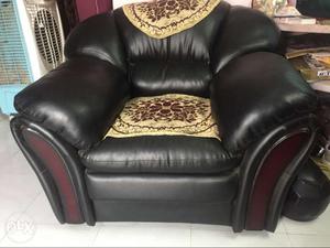 Relaxed cushion sofa in damaged condition