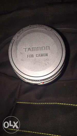 Round Gray Tamaon For Camon Labeled Bottle