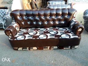 Tufted Brown And White Leather Couch